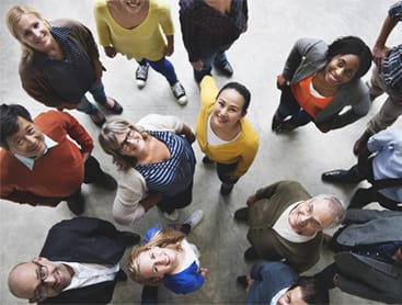 a group of people sitting on the floor