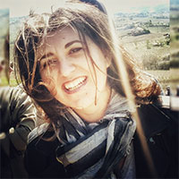 Tesi-Concetta-DEmma a woman with long hair smiling