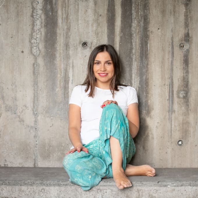 a woman sitting on a step